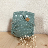 WickelArt Wollüberhose Mini Schneeflöckli vorne