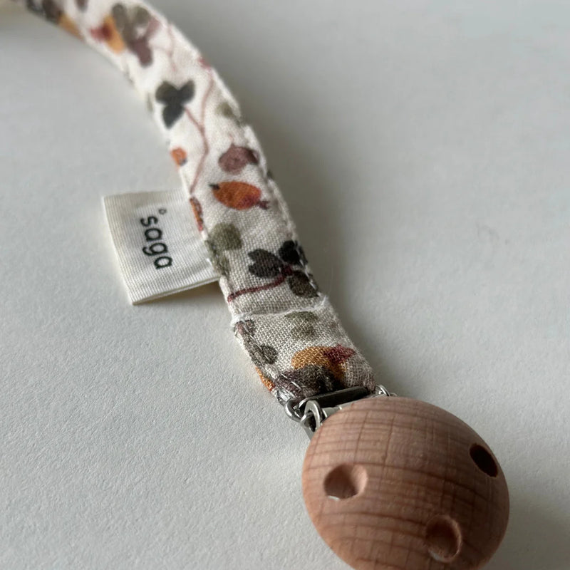 SAGA COPENHAGEN Nuggiband mit Clip | WickelArt